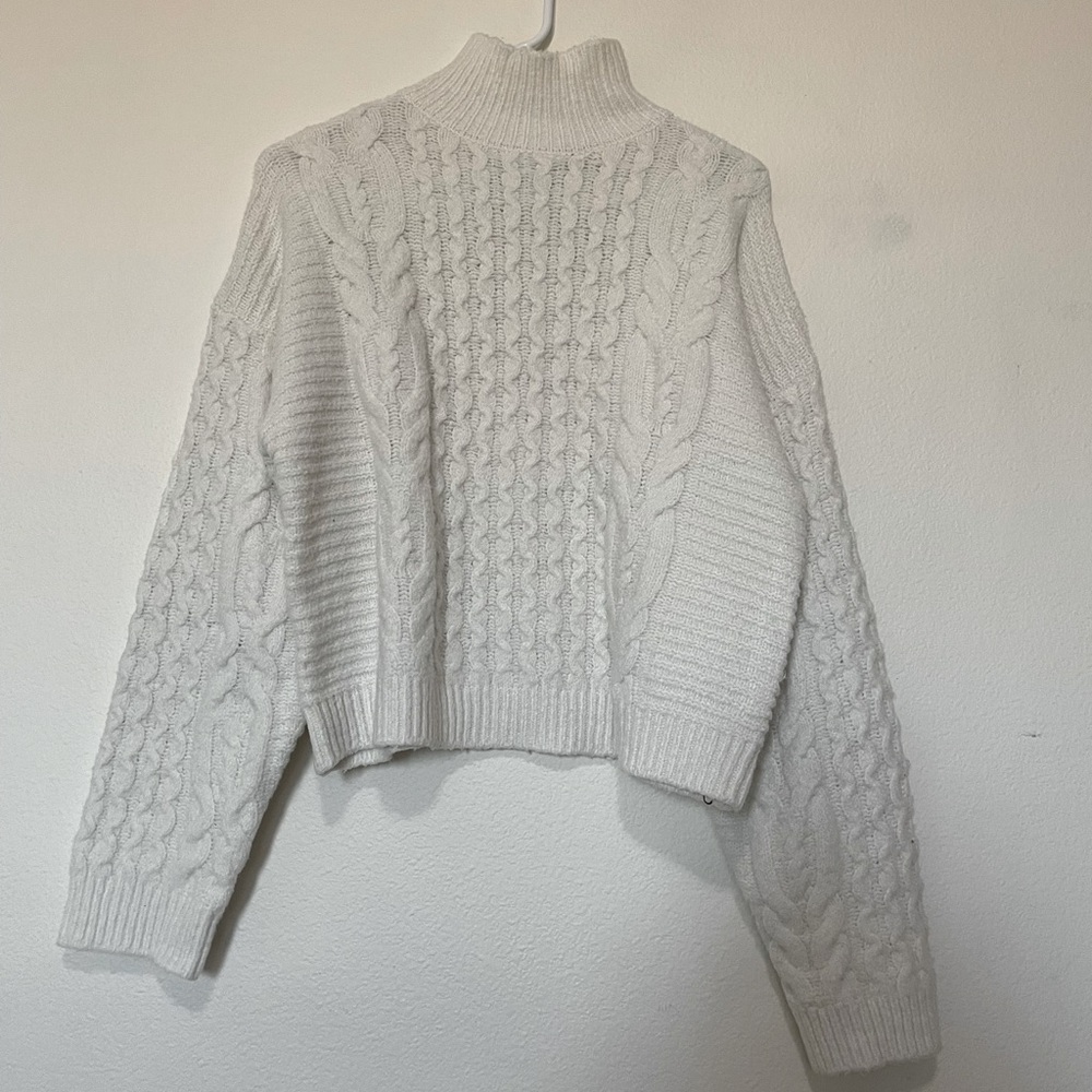 White turtleneck sweater